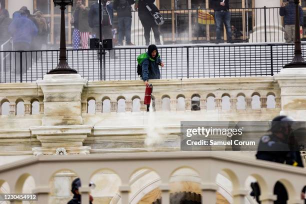 Pro-Trump supporters storm the U.S. Capitol following a rally with President Donald Trump on January 6, 2021 in Washington, DC. Trump supporters...