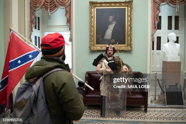 Aaron Mostofsky, a supporter of US President Donald Trump protests in the US Capitol Rotunda on January 6 in Washington, DC. Demonstrators breeched...