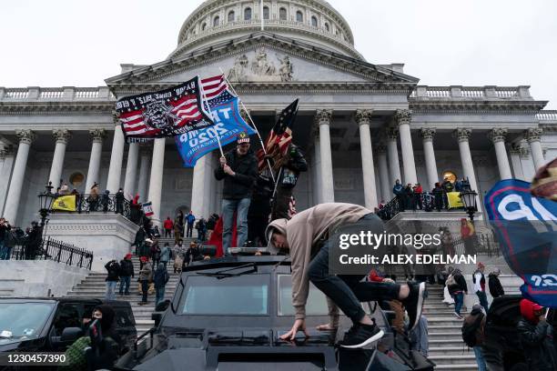 Supporters of US President Donald Trump protest outside the US Capitol on January 6 in Washington, DC. - Demonstrators breeched security and entered...
