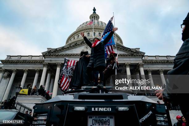 Supporters of US President Donald Trump protest outside the US Capitol on January 6 in Washington, DC. - Demonstrators breeched security and entered...