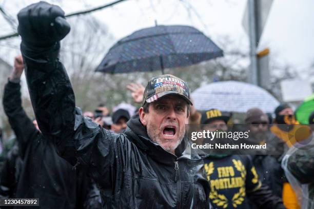 Supporter of President Trump yells toward counter-protesters on January 6, 2021 in Salem, Oregon. Trump supporters gathered at state capitals across...