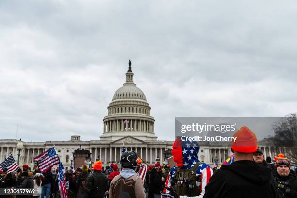 Pro-Trump protesters gather in front of the U.S. Capitol Building on January 6, 2021 in Washington, DC. A pro-Trump mob stormed the Capitol, breaking...