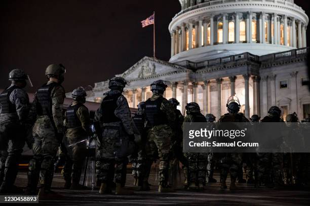 Members of the National Guard and the Washington D.C. Police stand guard to keep demonstrators away from the U.S. Capitol on January 06, 2021 in...