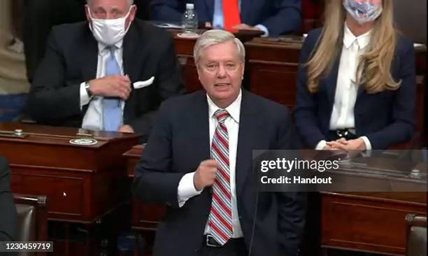 In this screenshot taken from a congress.gov webcast, Sen. Lindsey Graham speaks during a Senate debate session to ratify the 2020 presidential...