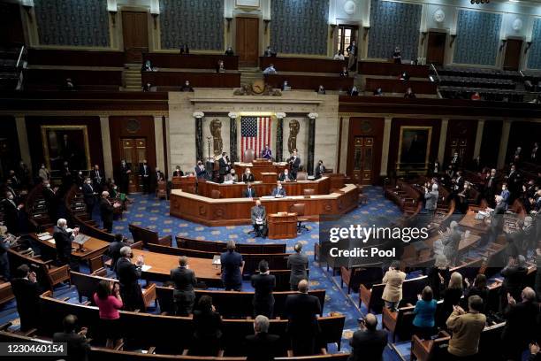 The House debates the certification of Arizona's Electoral College votes during a reconvening of a joint session of Congress to certify the Electoral...