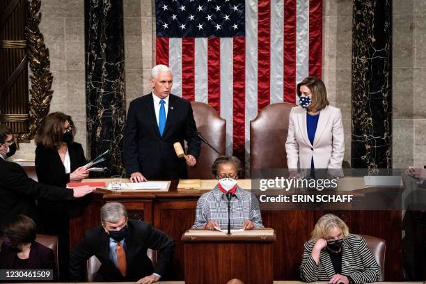 Vice President Mike Pence and House Speaker Nancy Pelosi preside over a Joint session of Congress to certify the 2020 Electoral College results after...