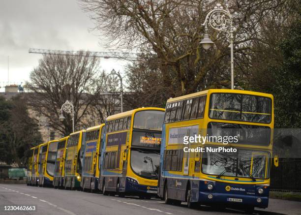 Line of empty public buses seen in Dublin city center. Ireland is going back into a full lockdown with the Government confirming a number of new...