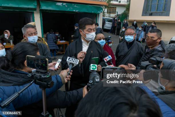 Dr. Lobsang Sangay, Sikyong Tibetan government in exile interacting with media after casting his vote to elect the new Sikyong and member of...