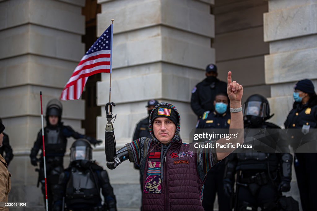 Pro-Trump supporters and far-right forces flooded...