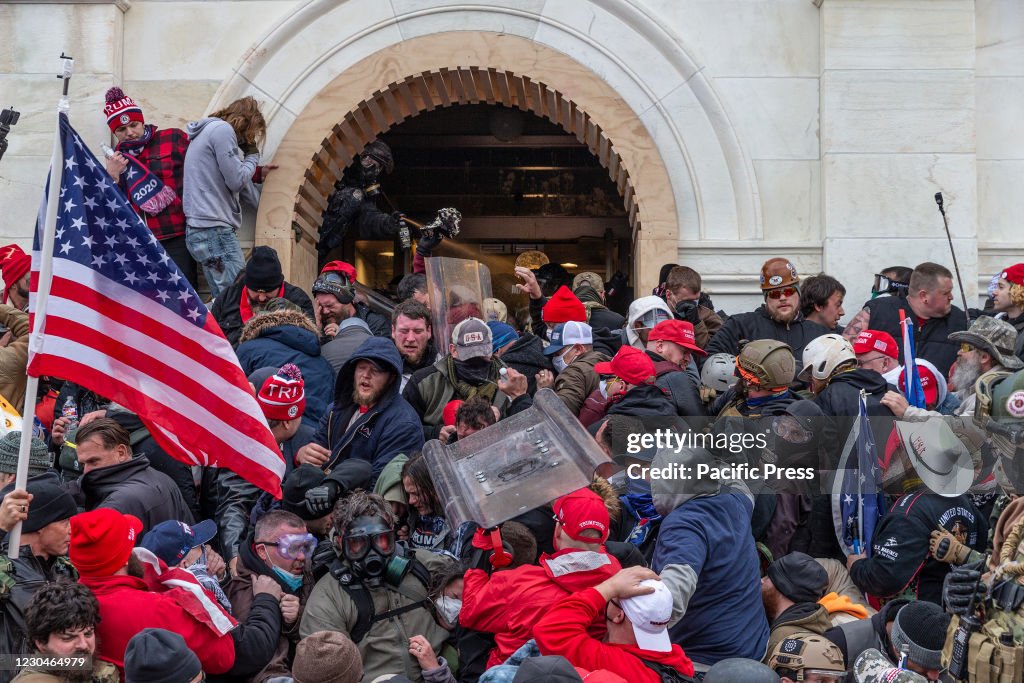 Police use tear gas around Capitol building where pro-Trump...
