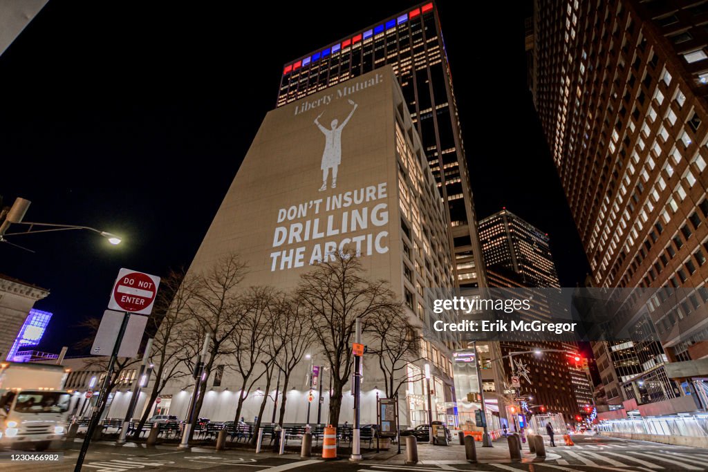 Activists with Rainforest Action Network and The Illuminator...