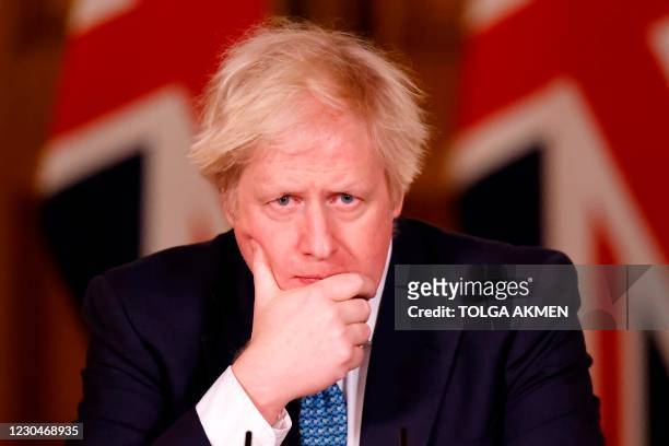 Britain's Prime Minister Boris Johnson attends a virtual press conference on the COVID-19 pandemic, inside 10 Downing Street in central London on...