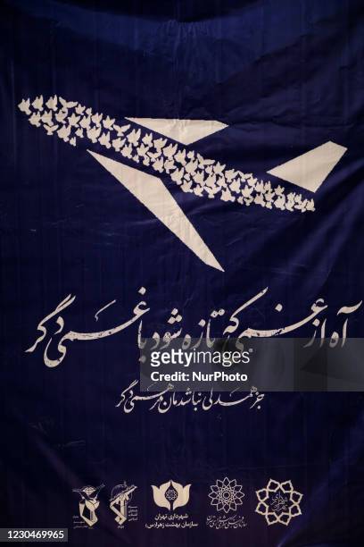 Banner with a Persian script that said, Oh from the sadness that is refreshed with another sorrow, is pictured during a ceremony to mark the death...