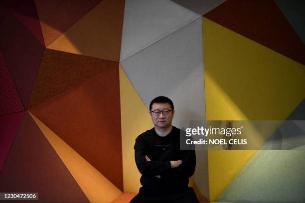 This picture taken on December 10, 2020 shows BlueCity CEO, Ma Baoli, China's largest dating app for gay men, posing for a portrait at the BlueCity...