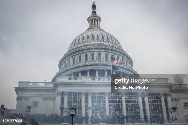 Tear gas outside the U.S Capitol, on January 06, 2021 in Washington, DC. The protesters stormed the historic building, breaking windows and clashing...