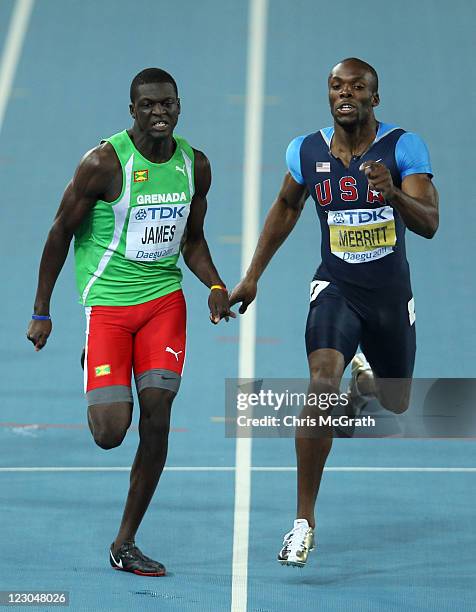 Kirani James of Grenada and LaShawn Merritt of United State compete in the men's 400 metres final during day four of the 13th IAAF World Athletics...