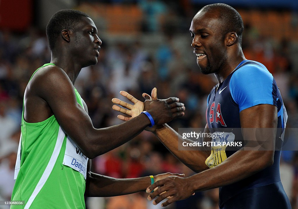 US athlete LaShawn Merritt (R) shakes ha