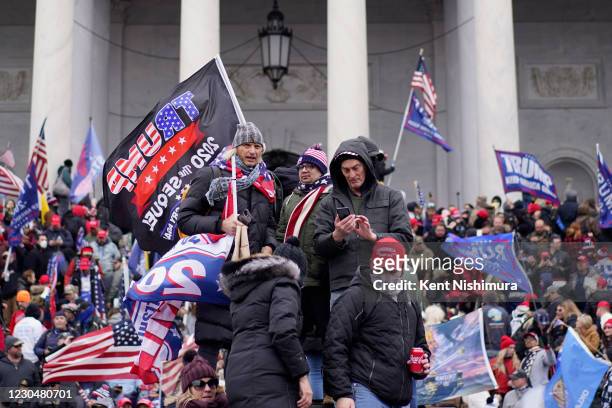 Protesters gather storm the Capitol and halt a joint session of the 117th Congress on Wednesday, Jan. 6, 2021 in Washington, DC.