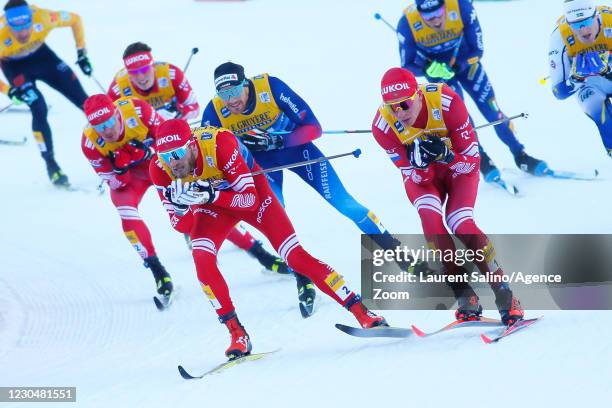 Alexander Bolshunov of Russia takes 1st place, Artem Maltsev of Russia during the COOP FIS Cross-Country Stage World Cup Men's 15 km Classic Mass...