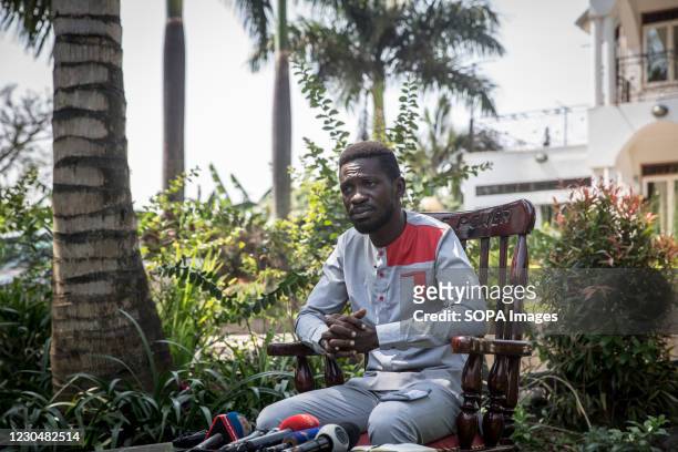 Opposition presidential candidate Bobi Wine, whose real name is Robert Kyagulanyi speaks during a press conference where he announced a petition to...