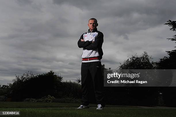 Wayne Rooney poses during the England press conference ahead of their UEFA EURO 2012 Group G qualifier against Bulgaria at London Colney on August...