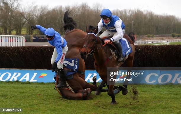 Cepage ridden by Charlie Deutsch clears a fence before going on to win the Watch Racing For Free At Coral Handicap Chase as Esprit Du Large ridden by...