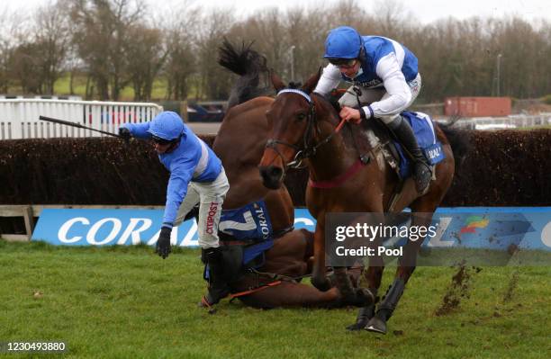 Cepage ridden by Charlie Deutsch clears a fence before going on to win the Watch Racing For Free At Coral Handicap Chase as Esprit Du Large ridden by...