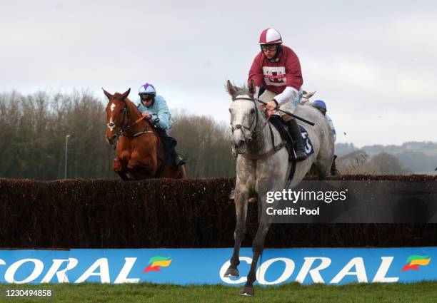 Ask Me Early ridden by Sean Bowen clears a fence and goes on to win the Coral Supporting Prostate Cancer Novices' Limited Handicap Chase during the...
