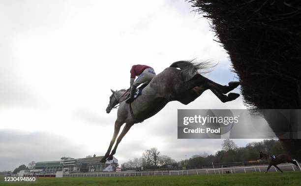 Ask Me Early ridden by Sean Bowen clears a fence and goes on to win the Coral Supporting Prostate Cancer Novices' Limited Handicap Chase during the...