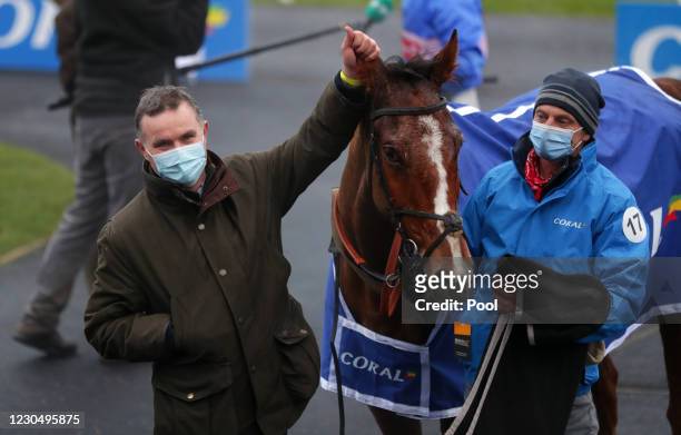 Trainer Evan Williams with Secret Reprieve after it won the Coral Welsh Grand National Handicap Chase at Chepstow Racecourse on January 9, 2021 in...