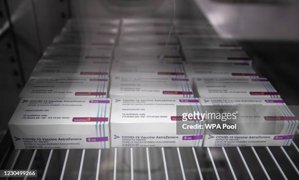 Boxes of vials of the AstraZeneca Covid vaccine sit in a fridge at Ashton Gate Stadium in Bristol, which is one of seven mass vaccination centres...