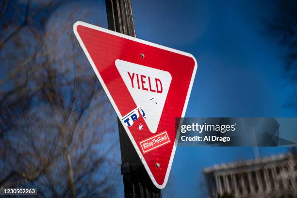 Stop The Steal" sticker is attached to a yield sign near the U.S. Capitol on January 9, 2021 in Washington, DC. A pro-Trump mob stormed and...