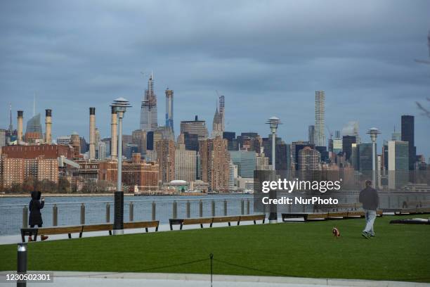 New York City skyline panorama, early morning spectacular view at the magic hour before sunrise. Manhattan office buildings, skyscrapers, Lower...