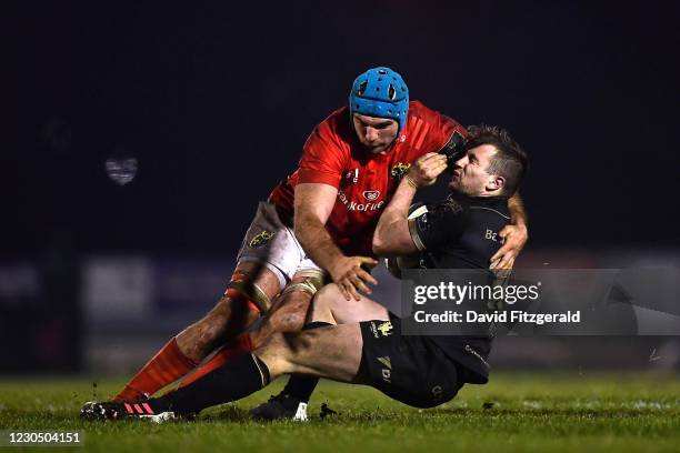 Galway , Ireland - 9 January 2021; Jack Carty of Connacht is tackled by Tadhg Beirne of Munster during the Guinness PRO14 match between Connacht and...