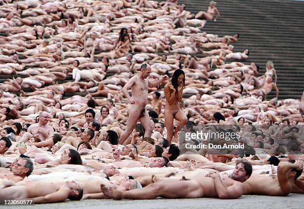 Image contains nudity.)Nude members of the public of the public take part in "Mardi Gras: The Base", an art installation by artist Spencer Tunick, at...