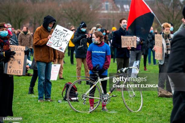 Protesters demonstrate against fascism in the Westerpark in Amsterdam, on January 10, 2021. - The demonstration was called following the assault on...