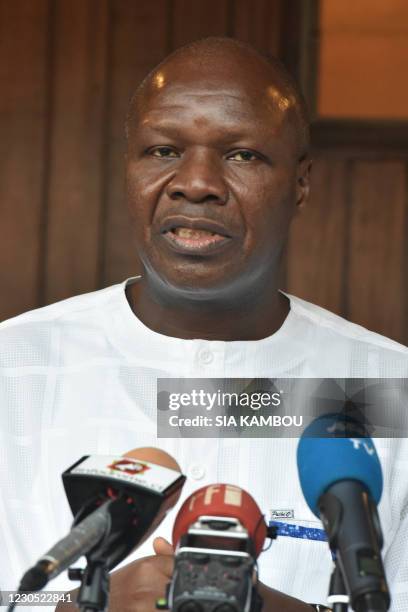 The President of the Union for Democracy and Peace in Cote d'Ivoire Albert Mabri Toikeusse speaks to the press after his meeting with former Ivorian...