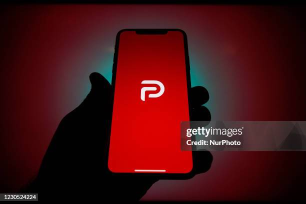 The Parler logo is seen on an Apple iPhone in this photo illustration in Warsaw, Poland on January 10, 2021. The Parler app, developed as an...