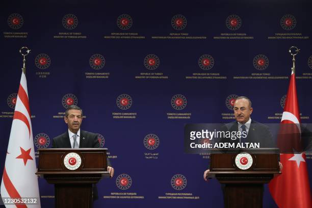 Turkish Foreign Minister Mevlut Cavusoglu and Turkish Cypriot Foreign Affairs Minister Tahsin Ertugruloglu hold a joint press conference after their...