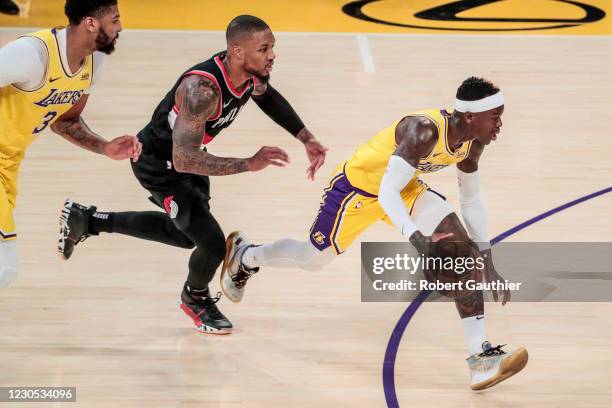 Los Angeles, CA, Monday, December 28, 2020 -Los Angeles Lakers guard Dennis Schroder is chased by Portland Trail Blazers guard Damian Lillard during...