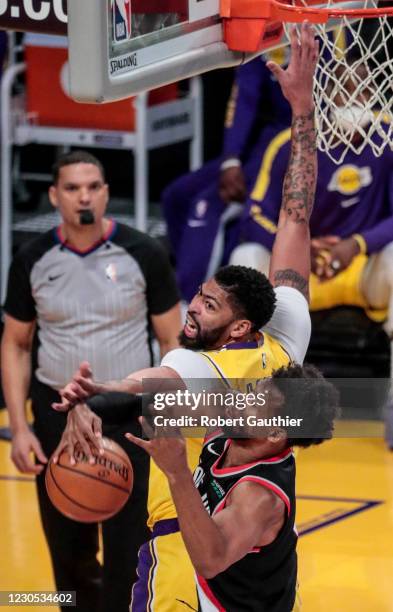 Los Angeles, CA, Monday, December 28, 2020 - Portland Trail Blazers guard Rodney Hood takes the ball from Los Angeles Lakers forward Anthony Davis...