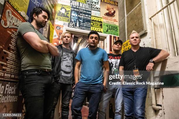 Andy Carr, Tommy Gentry, Dante Gizzi, Jools Gizzi and Paul McManus of Scottish hard rock group Gun, photographed backstage before a live performance...