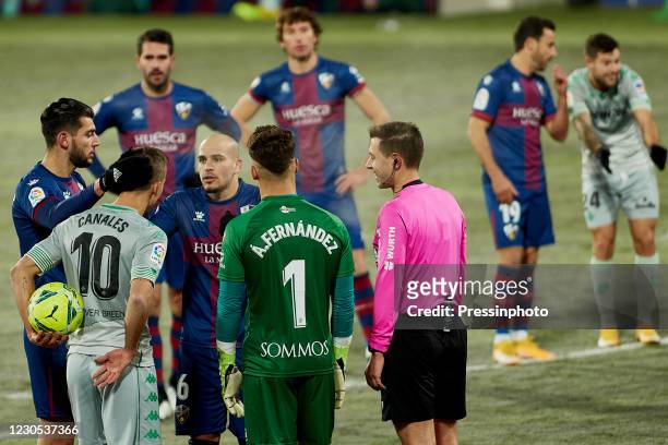 Sergio Canales of Real Betis, Rafa Mir, Sandro Ramirez, Alvaro Fernandez of SD Huesca and Adrian Cordero Vega during the La Liga match between SD...
