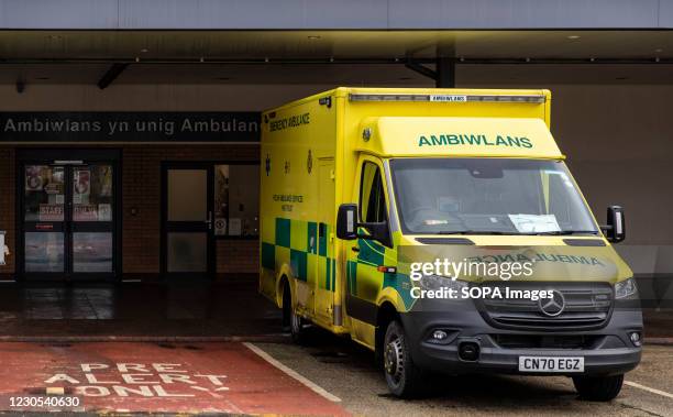 View of an ambulance parked at Morrison Hospital in Wales. Due to rising levels of covid infection - and the high prevalence of a more infectious...