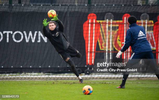 Loris Karius and goalkeeper coach Michael Gspurning of 1 FC Union Berlin during the training at the sports ground Haemmerlingstrasse on January 12,...