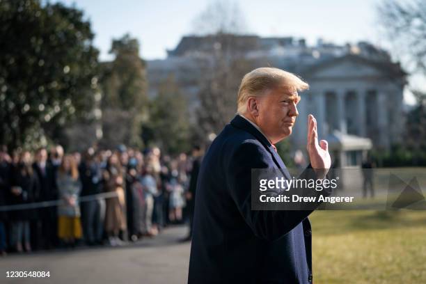 President Donald Trump waves as he walks to Marine One on the South Lawn of the White House on January 12, 2021 in Washington, DC. Following last...