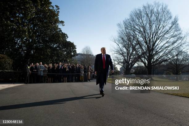 President Donald Trump walks to speak to the press before walking to Marine One on the South Lawn of the White House on January 12, 2021 in...