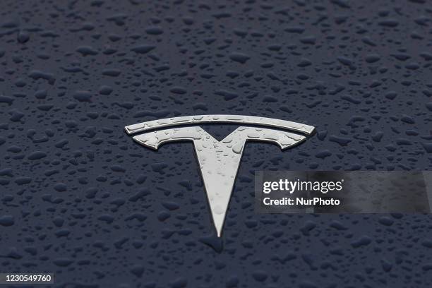 Tesla logo seen on a parked car in Dublin city center. On Tuesday, January 11 in Dublin, Ireland.