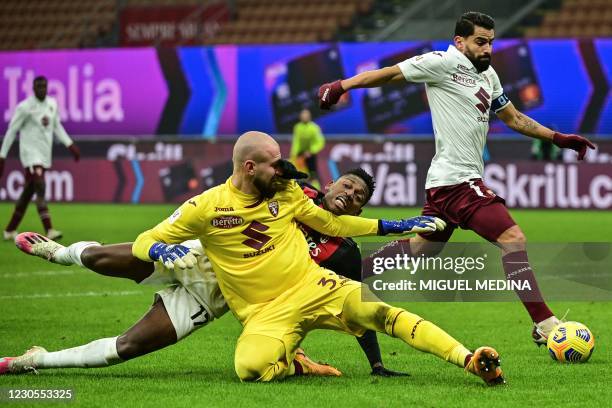 Torino's Serbian goalkeeper Vanja Milinkovic-Savic and AC Milan's Portuguese forward Rafael Leao collide as Torino's Venezuelan midfielder Tomas...