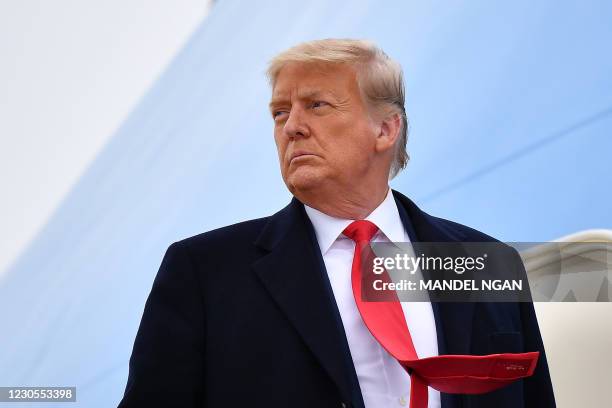 President Donald Trump boards Air Force One before departing Harlingen, Texas on January 12, 2021.